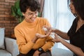 People sharing hand sanitizer to prevent infection