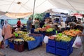 People shop for fresh fruit and vegetables at an open-air market. Turkish bazaar with fresh and ripe fruits and Royalty Free Stock Photo