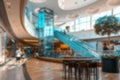 People shop window blurred background. Interior of retail centre store in soft focus. People shopping in modern commercial mall Royalty Free Stock Photo