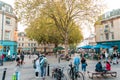 People and shoppers walking around in the Busy downtown area of the Bath Spa, the famous historical city of England