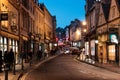 People and shoppers walking around in the Busy downtown area of the Bath Spa, the famous historical city of England