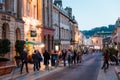 People and shoppers walking around in the Busy downtown area of the Bath Spa, the famous historical city of England