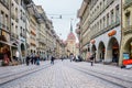 People on a shopping alley in the old city center of Bern, Switzerland