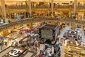 People shopping in luxury Lafayette department store of Paris, France Royalty Free Stock Photo