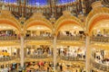 People shopping in luxury Lafayette department store of Paris, France Royalty Free Stock Photo