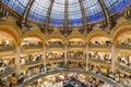 People shopping in luxury Lafayette department store of Paris, France Royalty Free Stock Photo