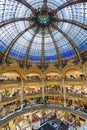 People shopping in luxury Lafayette department store of Paris, France Royalty Free Stock Photo