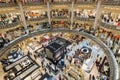 People shopping in luxury Lafayette department store of Paris, France Royalty Free Stock Photo