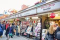 People shopping in Nakamise market, the traditional shopping street located at Sensoji Temple, Asakusa, Japan