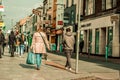 People shopping on Oliver Plunkett St, one of the city`s main streets for stores, street performers, restaurants, and busy city. Royalty Free Stock Photo