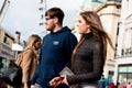 People shopping on Patrick Street in Cork, the city`s main street for stores, street performers, restaurants, and busy city life. Royalty Free Stock Photo