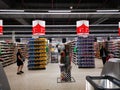 People at shopping in the supermarket Auchan