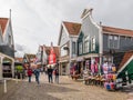 People and shops in main street Haven in Volendam, Noord-Holland, Netherlands Royalty Free Stock Photo