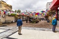 People, shops and Market Street from Pucioasa