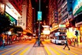 People, shops and neon signs in Hong Kong