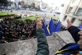 People show the Victory Sign from the balcony where Nicolae Ceausescu held his last speech during the Romanian anti communist