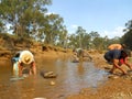 People sieving for sapphires