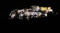 People silhouettes in the foreground, with Acropolis night view at the background