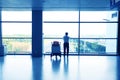 People silhouettes at morden office building Royalty Free Stock Photo