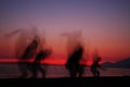 People silhouettes in sunset