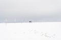 People silhouettes walking snow plain mountain top winter snow , winter