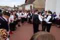 People sing and dance after the Mass on Thanksgiving day in Stitar, Croatia