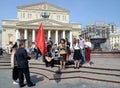 People sing songs of the war years at the Moscow Bolshoi theater on Victory Day