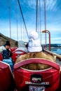 People sit on Big Bus Tour for sightseeing Golden Gate Bridge.