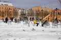 People sit on chairs in the winter on the island of new Holland