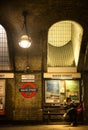 People sitting at bench at baker street station in london Royalty Free Stock Photo