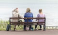 People sitting on a bench