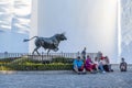 People sitting at Bull monument Ronda Spain