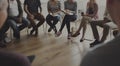 People sitting in a circle counseling Royalty Free Stock Photo