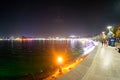 People sitting on the circular area around kankaria lake in Ahmedabad