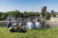 People sitting on the fortress wall wieving Klaipeda