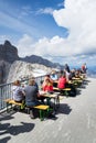 People sitting in front of Dachstein Panaromarestaurant on August 17, 2017 in Ramsau am Dachstein, Austria.