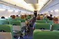 People sitting inside a Transavia airplane