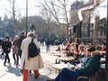 Cafe Bistrot Terrace People enjoying winter sun Paris