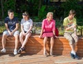 People sitting in the park and listening to the concert. Portraits