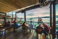 People sitting in popular cafe at Cengelkoy district in Asian side of Istanbul with view on Bosphorus