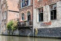 People sitting on a restaurant terrace in Embankment Graslei in