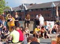 People sitting in the road at the extinction rebellion protest blocking victoria bridge in leeds