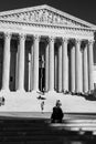 People Sitting on Steps of the United States Supreme Court Royalty Free Stock Photo