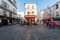 People sitting at the terrace of Le consulat restaurant in Montmartre