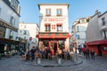 People sitting at the terrace of Le consulat restaurant in Montmartre