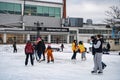 People skating at the Harbourfront Centre ice rink in Toronto. Royalty Free Stock Photo