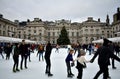 People skating on ice at the Somerset House Christmas Ice Rink. London, United Kingdom, December 2018.