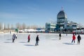 People skating at Old Port Ice Skating Rink