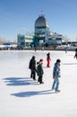 People skating at Old Port Ice Skating Rink
