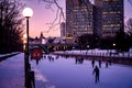 People skating on Rideau Canal Skateway, dusk, winter, Ottawa, Ontario, Canada Royalty Free Stock Photo